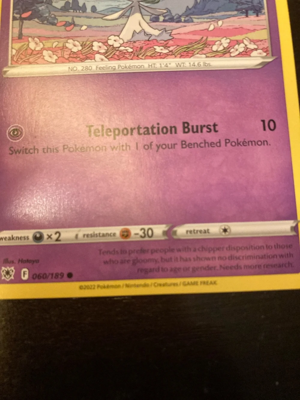 Pokemon Ralts Trading Card - Purple and Yellow Border